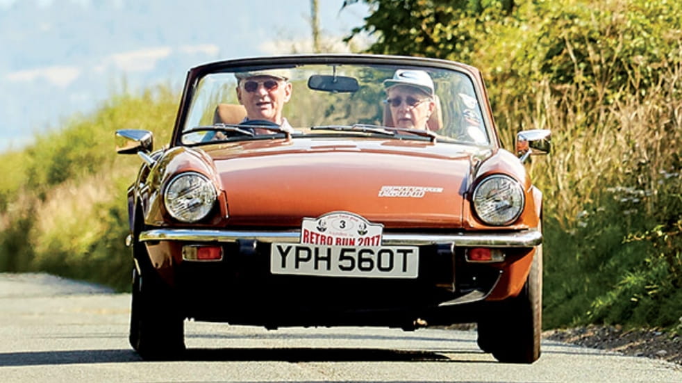 Classic car on a country lane